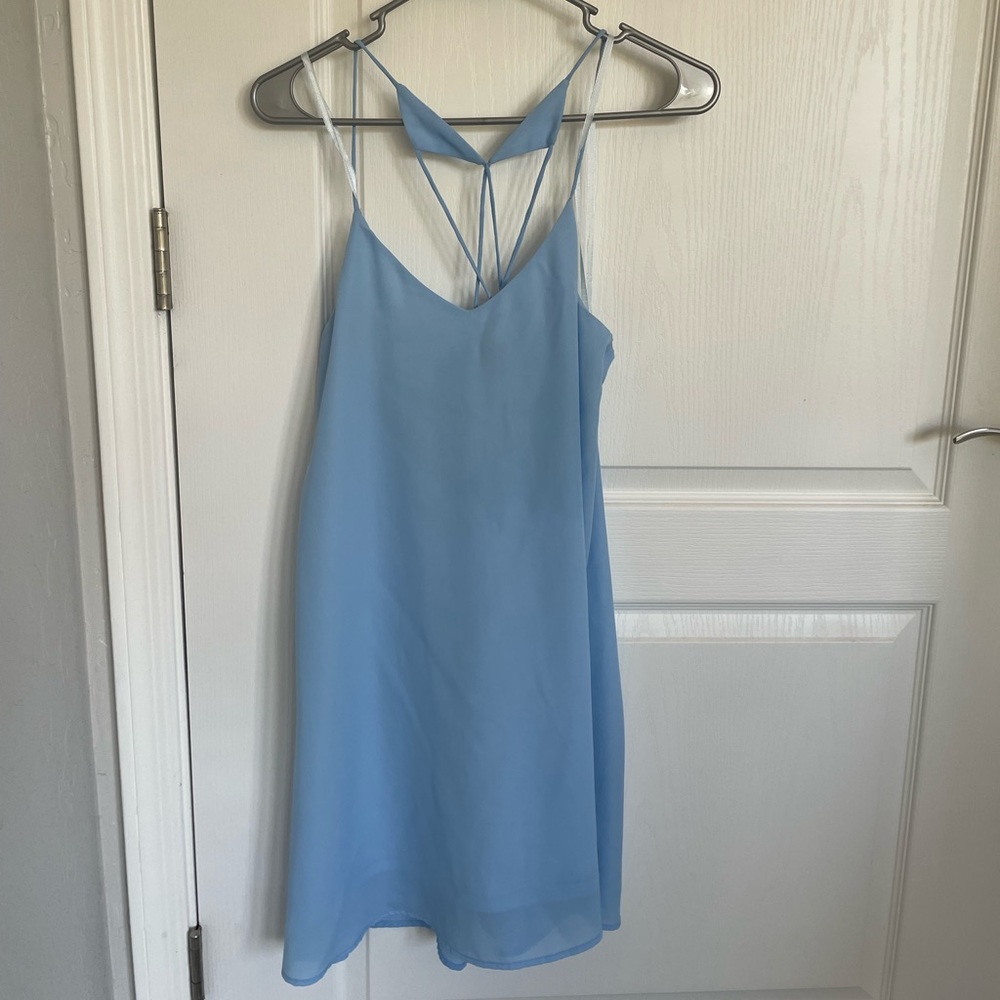 Blue flowy mini dress with strappy back